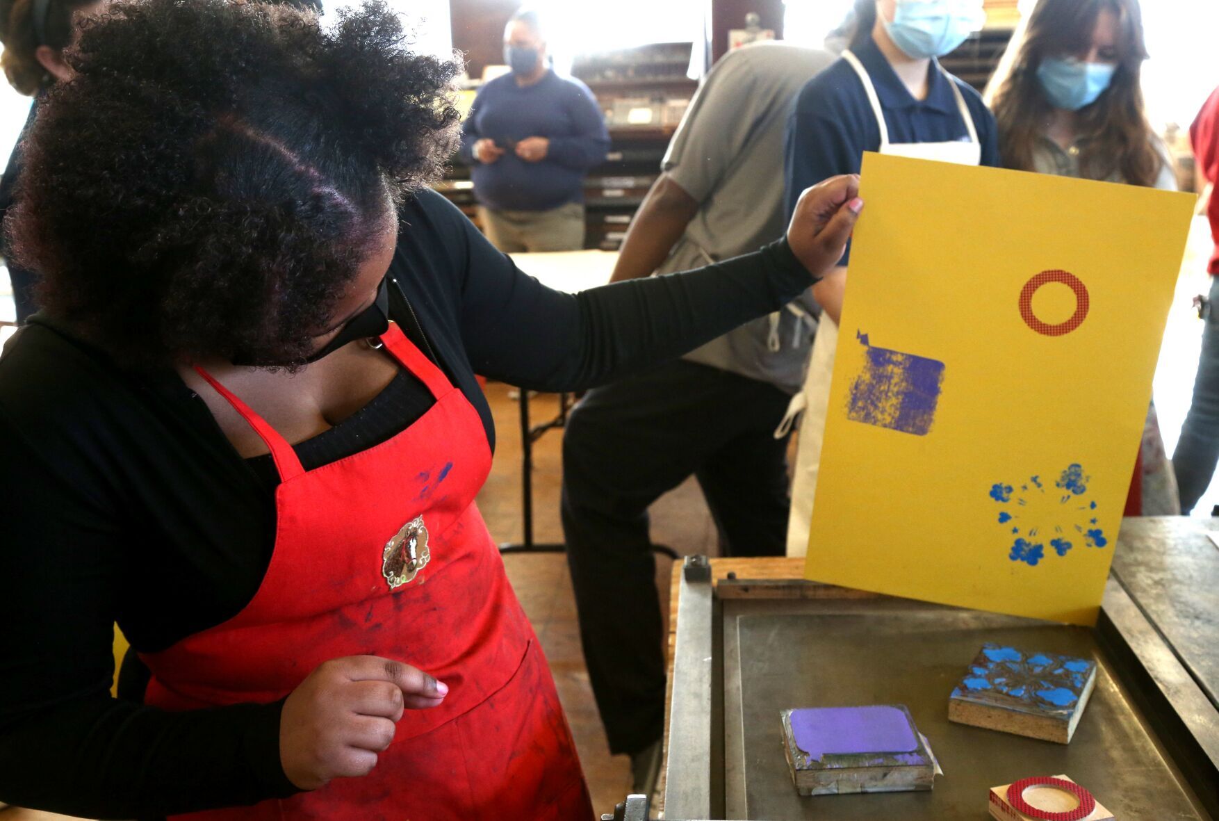 Student Magazine Staff Create Covers Outside Literary Magazine